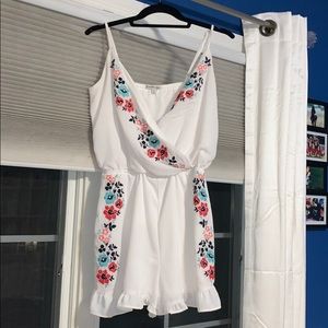 floral embroidered romper. NEVER WORN